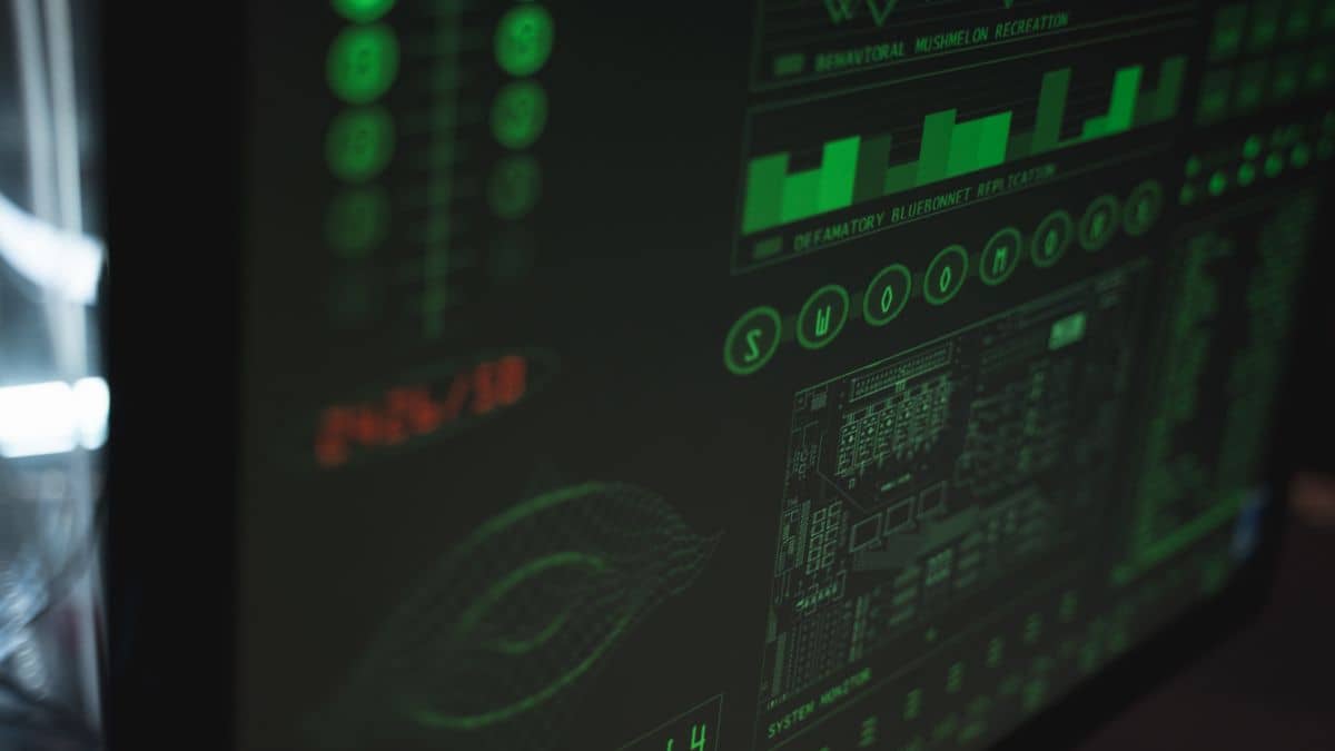 Close-up of a screen and hands, representing domain scams and phishing renewals to avoid