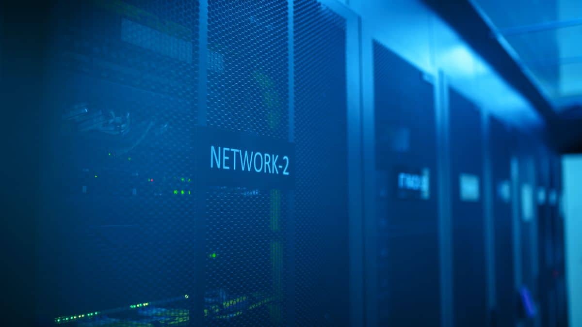 A network rack with cabling, illustrating the .net domain for networks and services